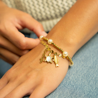 8mm Kiska Glass Pearl Stretch Bracelet with Starburst Chain and Charms