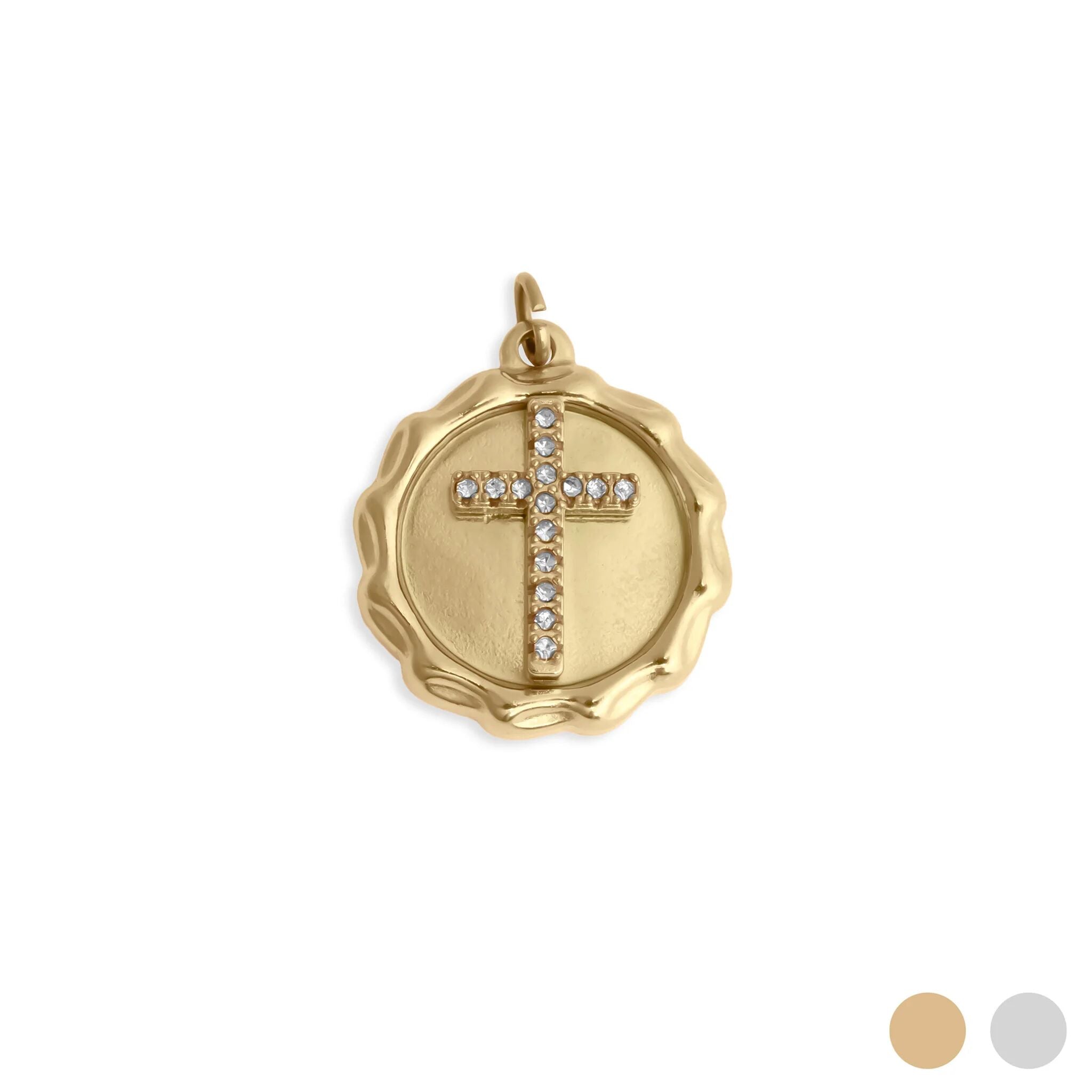 Gold pendant with a cross design on a white background