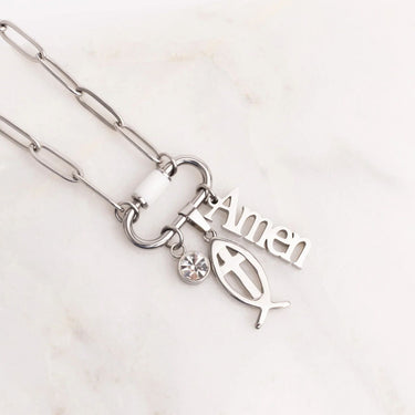 Silver necklace with 'Amen' and fish charm on a white background