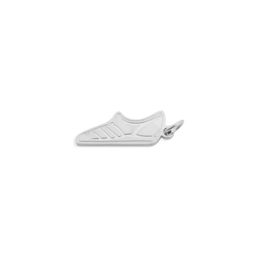 Silver shoe-shaped pendant on a white background