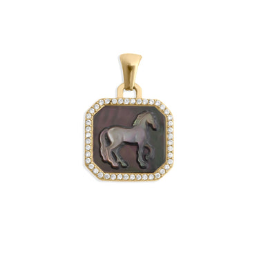 Gold pendant with a horse design and clear stones on a white background