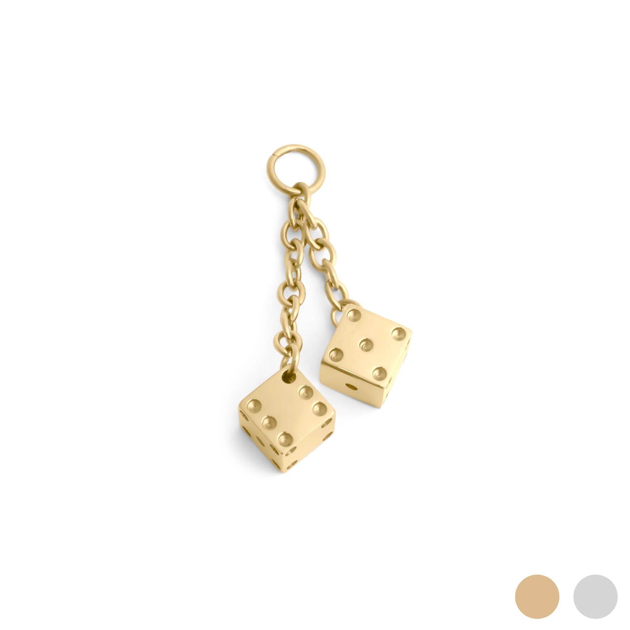 Gold dice charm on a chain against a white background