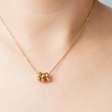 Gold Rounded Spacer Beads on loop/cable chain
