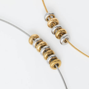 Gold and Silver Rounded Spacer Beads on gold and silver collar necklace 
