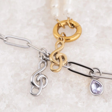 Wholesale jewelry 18K Gold PVD Stainless Steel Treble Clef Charm- stainless and gold studio 