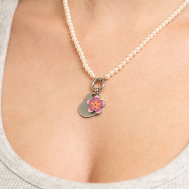 Polished Heart Pendant with flower charm on pearl necklace