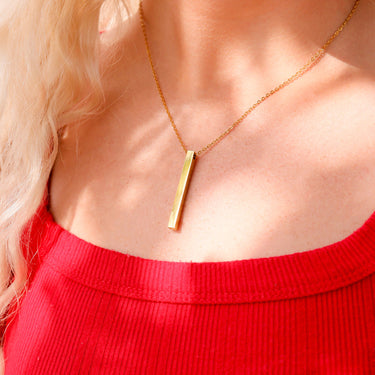 Chain necklace with vertical bar pendant lifestyle photo