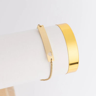 Gold hoop earring on a white background