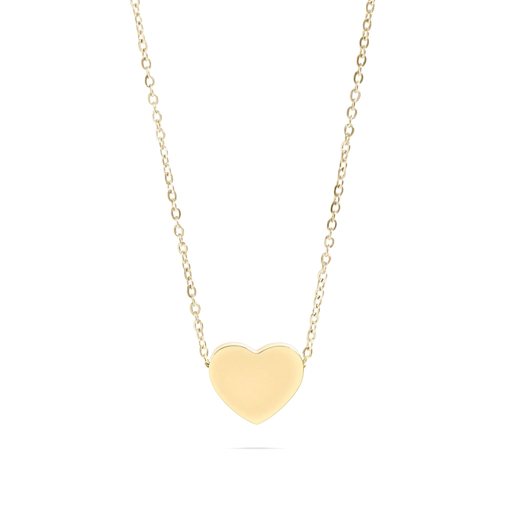 Gold heart-shaped pendant necklace on a white background