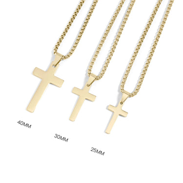 Three gold cross necklaces of different lengths on a white background