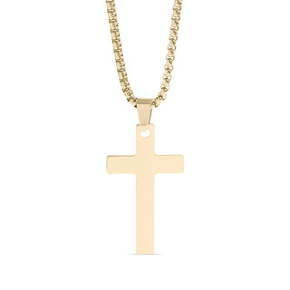Gold cross necklace on a white background