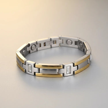Two-tone silver and gold bracelet on a light background