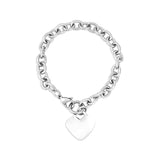 A silver stainless steel heart-shaped bracelet with a blank space for engraving, displayed against a white background.