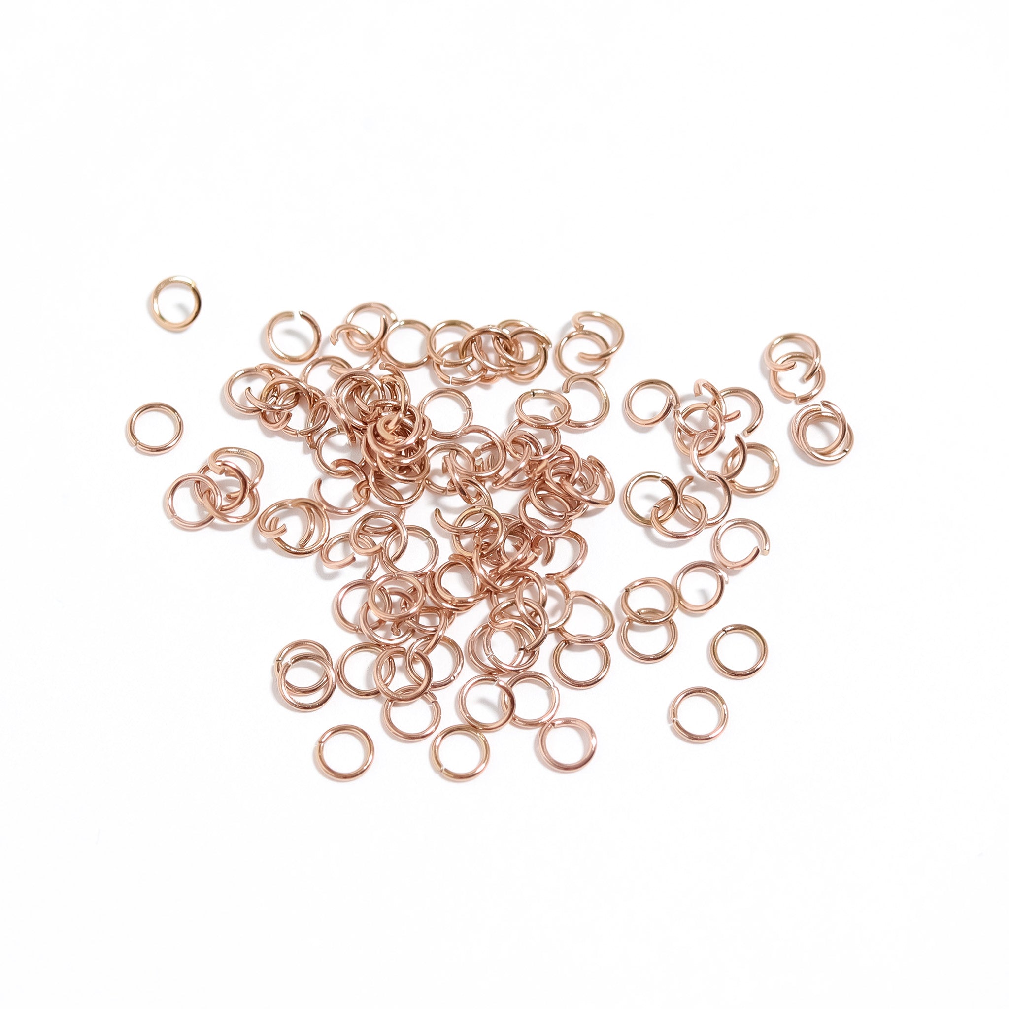 100 Pack 18K Rose Gold PVD Rostfritt stål Sågklippningsringar / ENC0005