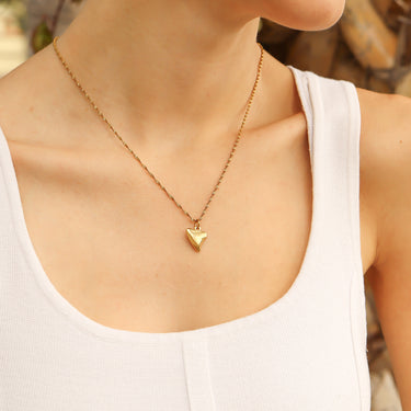 shark tooth charm on a chain