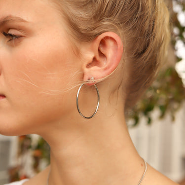 Boucles d'oreilles à tube rond en acier rond en acier inoxydable 18 carats/ERJ2138