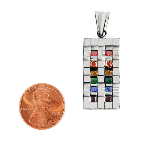 Stainless steel contemporary wavy Cubic Zirconia rainbow pendant with a penny for scale.