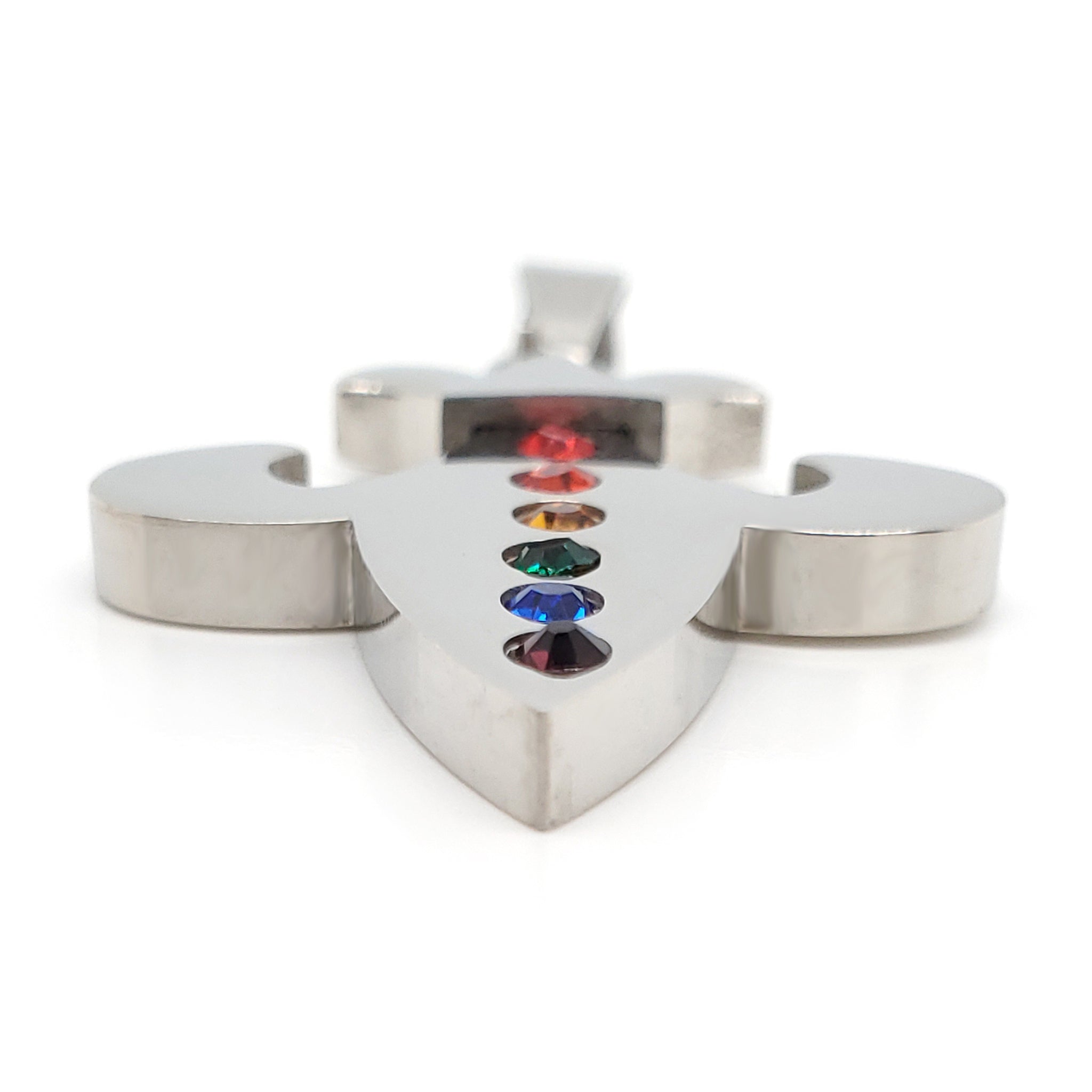Stainless steel Cubic Zirconia rainbow Fleur de Lis pendant at an angle.