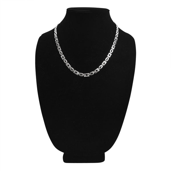 Stainless steel oval and rectangle fancy chain necklace on a balck velvet bust.