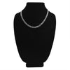Stainless steel rectangle cutout fancy chain necklace on a black velvet bust.
