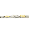 Close up of a stainless steel and gold color necklace clasp.