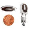Stainless steel and wood texture oval cufflinks with a penny for scale.