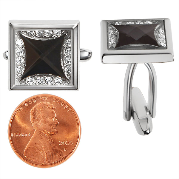 Stainless steel and black Cubic Zirconia cufflinks with a penny for scale.