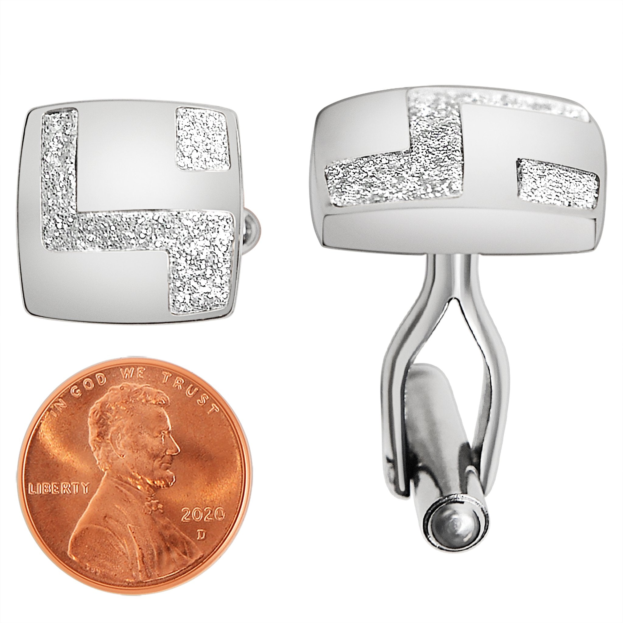 Stainless steel abstract square cufflinks with a penny for scale.