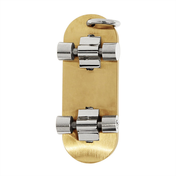 Stainless steel 18K gold PVD Coated skull Cubic Zirconia skateboard pendant, back view.