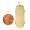 Stainless steel 18K gold PVD Coated skull Cubic Zirconia skateboard pendant with a penny for scale.
