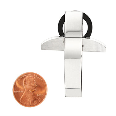 Stainless steel Cross with black ring pendant with a penny for scale.