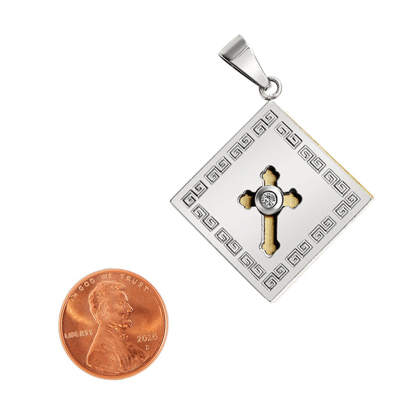Stainless steel and 18K gold PVD Coated spinner Cubic Zirconia Cross with Greek key accents pendant with a penny for scale.