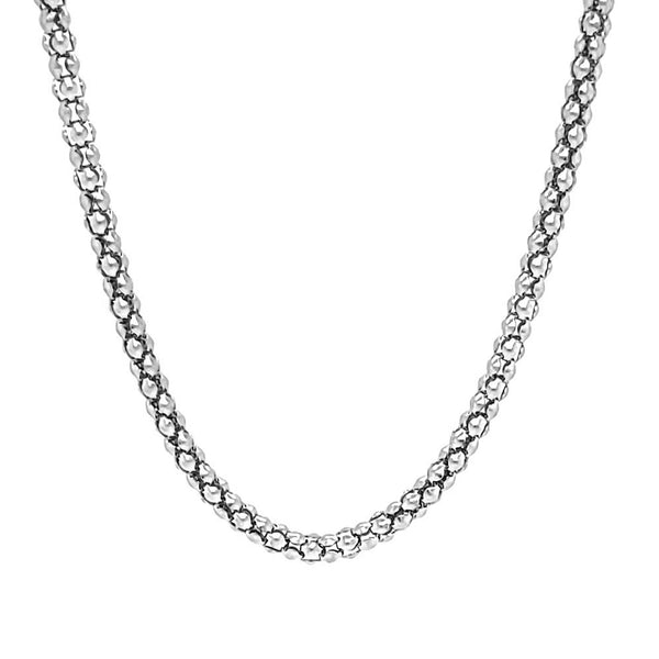 Stainless steel round snake chain necklace hanging.