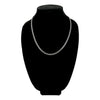 Stainless steel curb chain necklace on a black velvet bust.