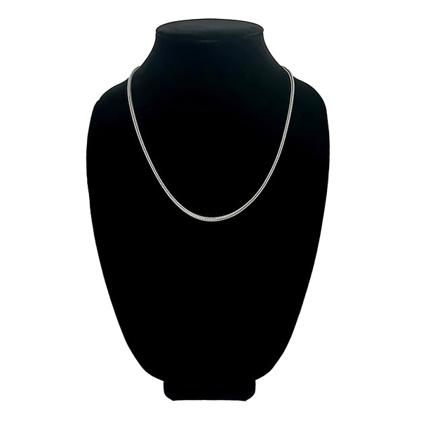 Stainless steel square snake chain necklace on a black velvet bust.