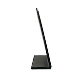 Small black velvet necklace display, side view.