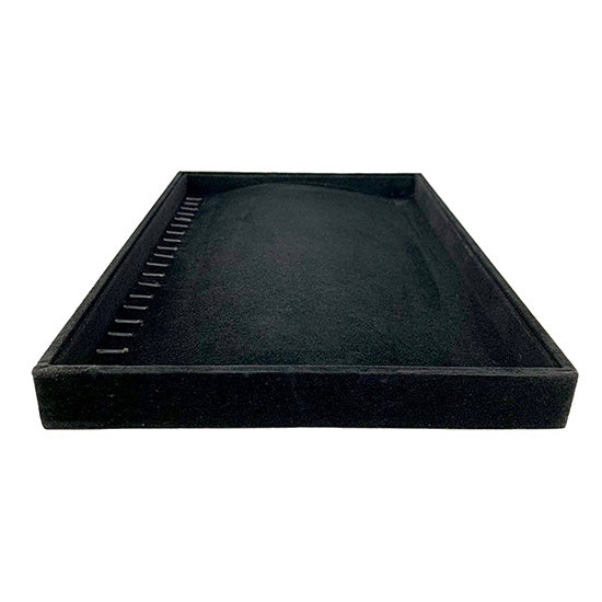 Large black velvet flat necklace display at an angle.