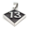 Stainless steel "13" pendant at an angle.