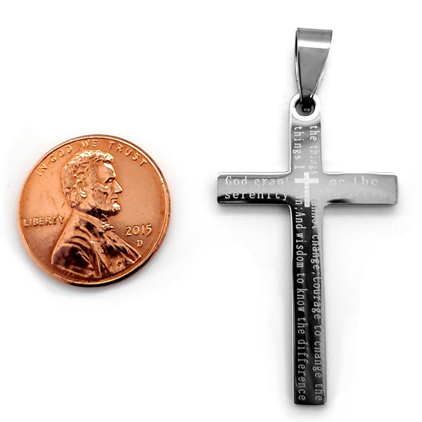 Serenity prayer cross stainless steel pendant with a penny for scale.