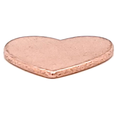 Copper blank heart pendant at an angle.