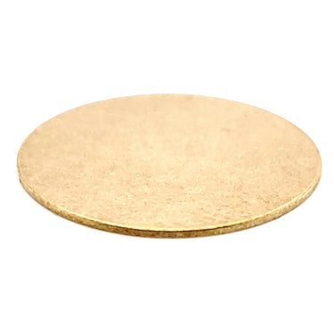 Brass blank round pendant at an angle.