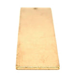Brass blank vertical rectangle pendant at an angle.