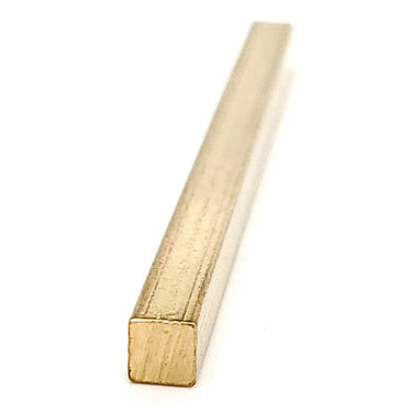 Brass blank bar rectangle pendant at an angle.