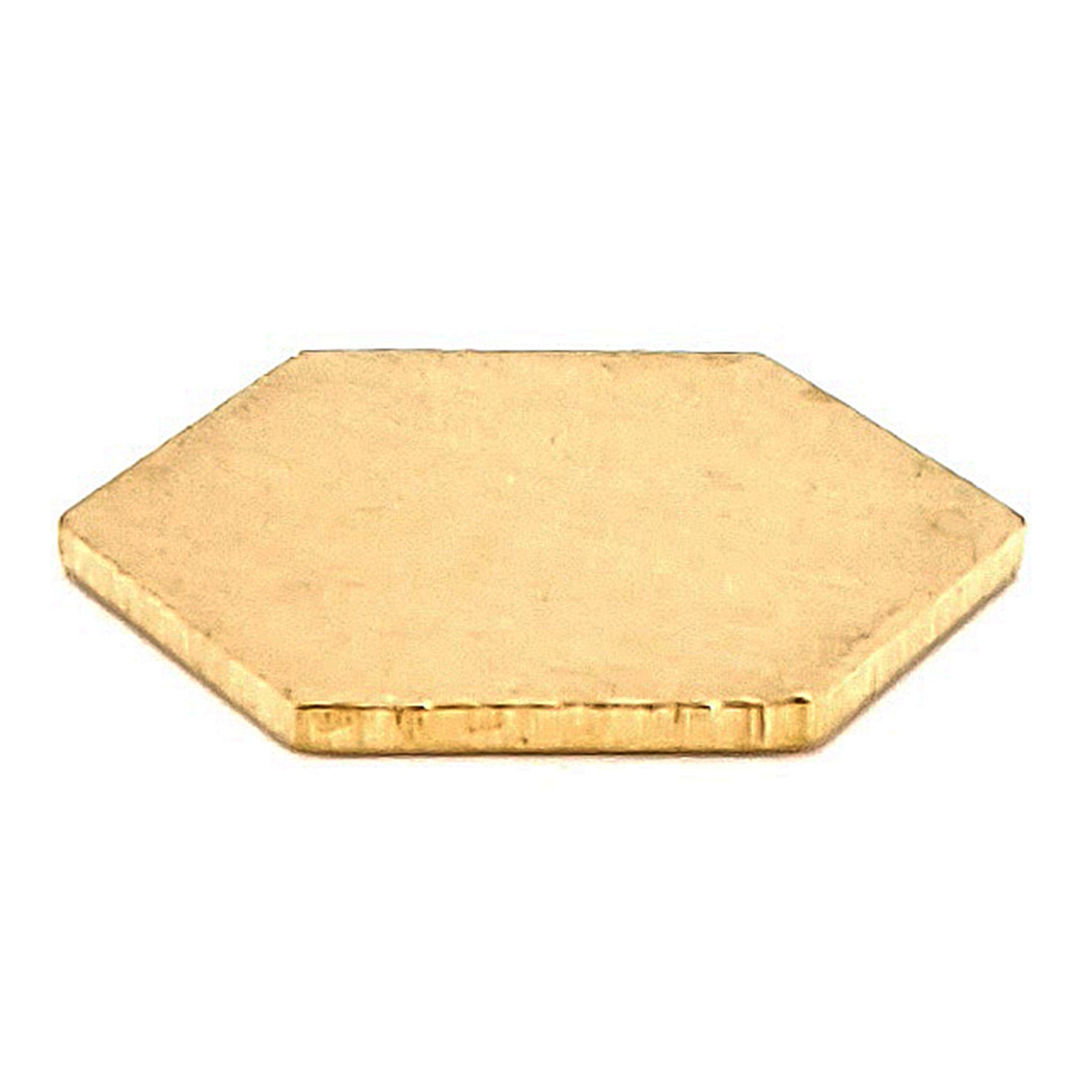 Brass blank hexagon pendant at an angle.