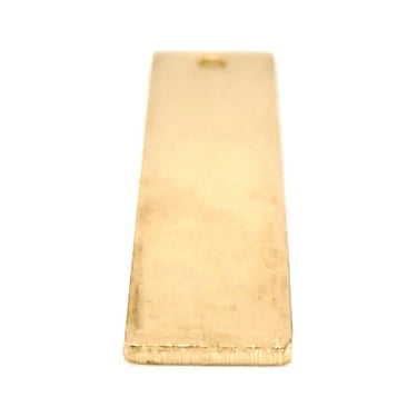 Brass blank vertical rectangle pendant at an angle.