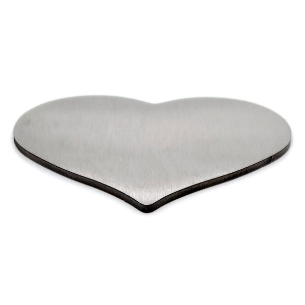 Stainless steel blank heart pendant brushed side at an angle.