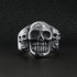 products/SCR3038-Detailed-Skull-With-Accent-Skulls-Stainless-Steel-Polished-Ring-Lifestyle-Front.jpg