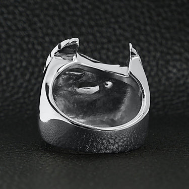 Stainless steel "Live To Ride" "Ride To Live" eagle biker ring back view on a black leather background.