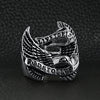 Stainless steel "Live To Ride" "Ride To Live" eagle biker ring on a black leather background.