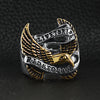 Stainless steel 18K gold PVD Coated "Live To Ride" "Ride To Live" eagle biker ring on a black leather background.